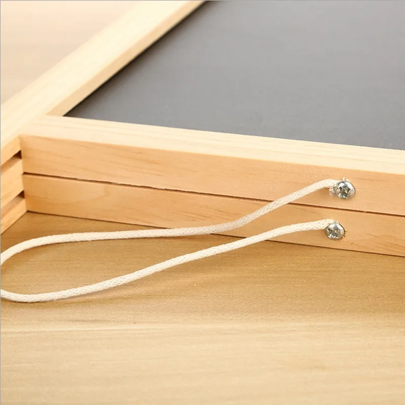 Wooden blackboard easel folded flat showing compact storage