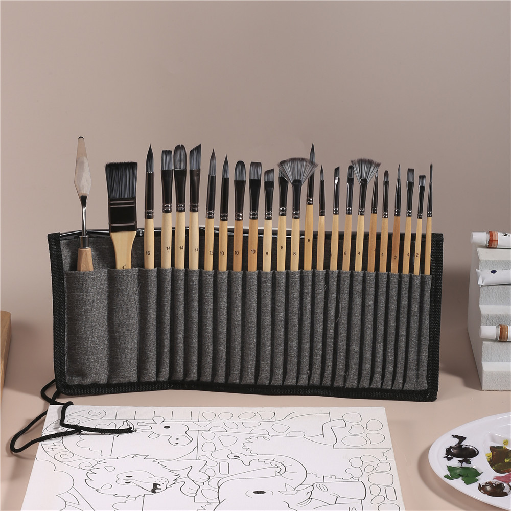 Paintbrush storage case unrolled showing 24 included brushes in fabric slots