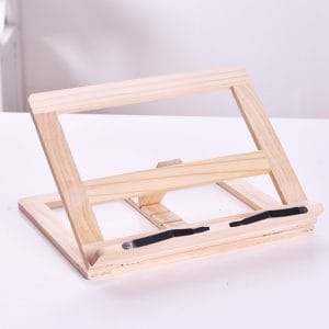 Wooden book easel with iron clamp detail close-up