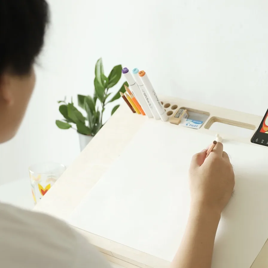 Adjustable drawing board smooth wooden surface close-up detail