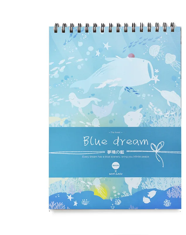 Illustrated sketchbook with blue whale dreamland artwork