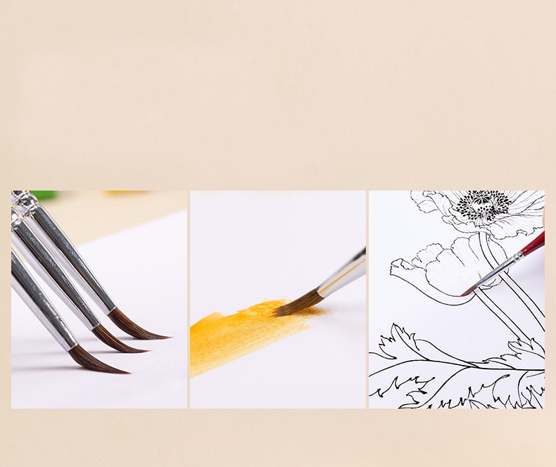 Fine detail brush set in use on miniature painting