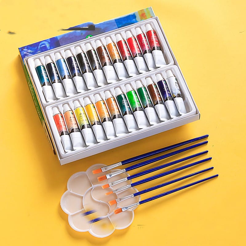 Beginner oil paint set in use on canvas with oil paints and brush