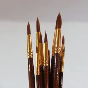 Watercolour brush set handles showing natural birch wood grain finish