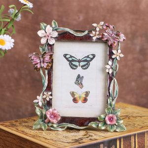 ornate photo frame with butterfly and pink floral decorative vintage design