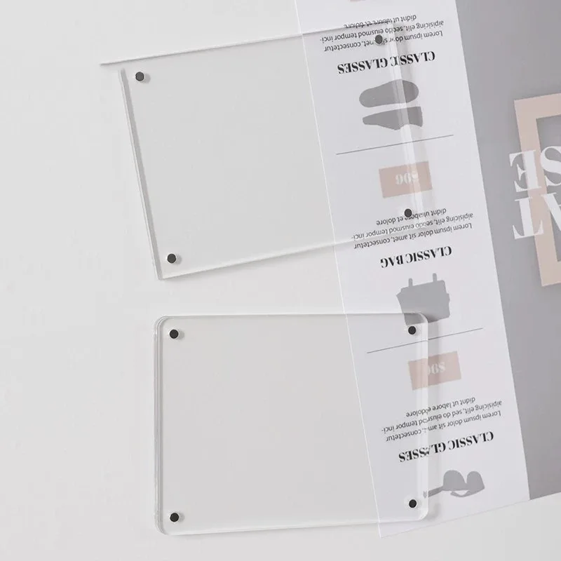 Magnetic acrylic photo frame showing panels separated with photo inside
