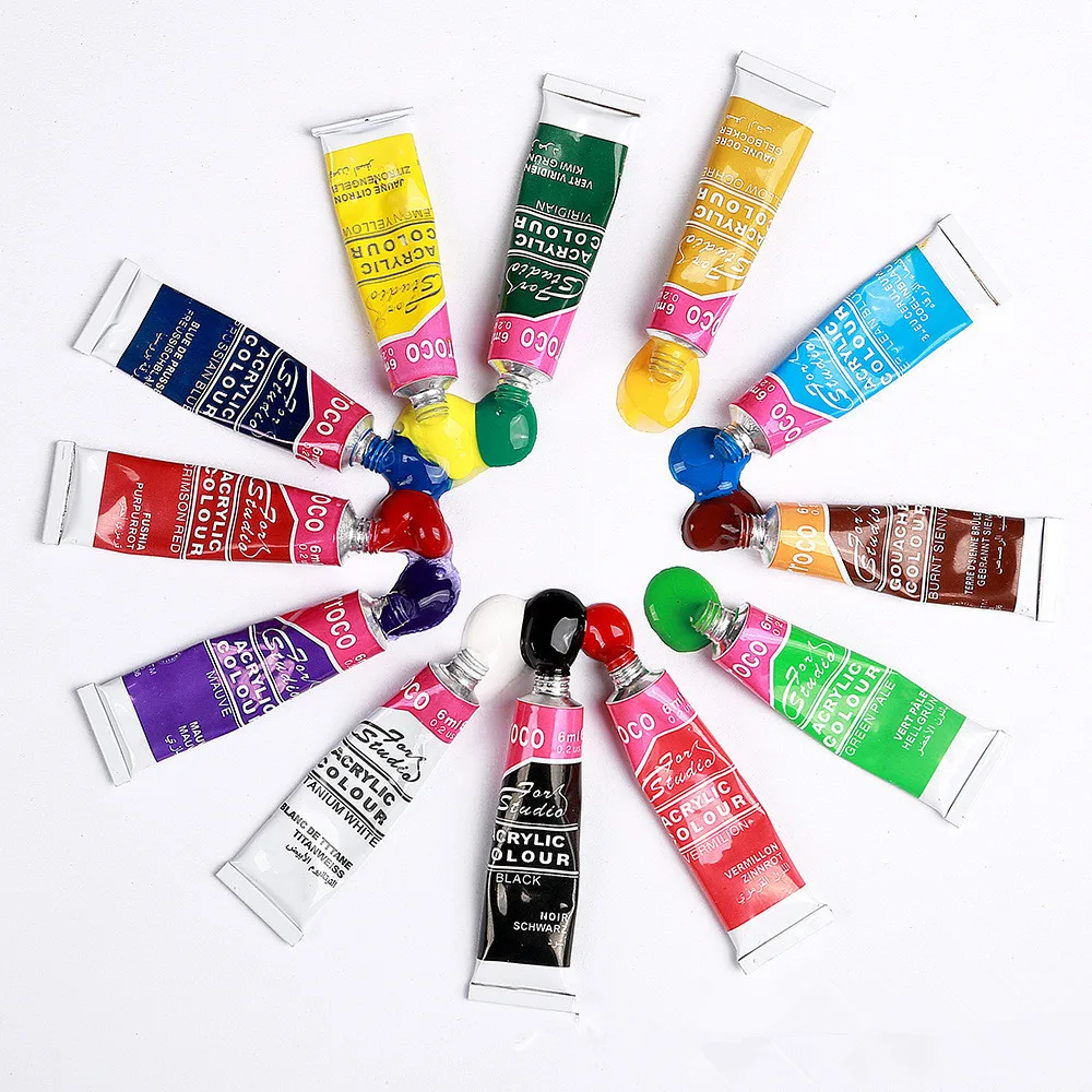 Acrylic paint set with brush arranged in a circle showing multiple colours squeezed from tubes