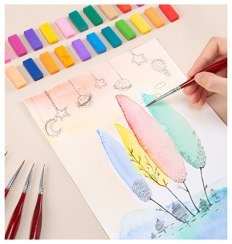 Fine detail brush set in use for outlining on canvas
