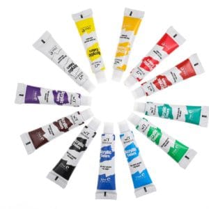 12 colour paint set acrylic tubes in compact packaging on white background