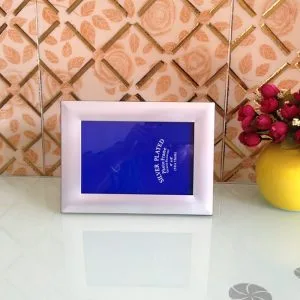 7 inch silver metal photo frame size reference against neutral background