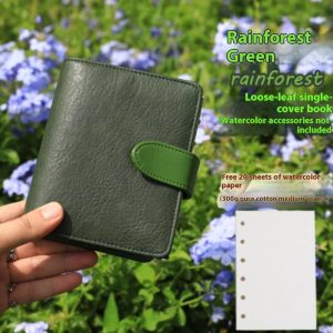 Compact A7 sketchbook next to hand for size reference