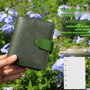 Compact A7 sketchbook next to hand for size reference