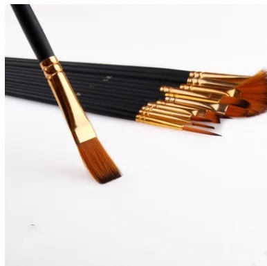 12 mixed brushes from carry case set laid out showing shapes and handles