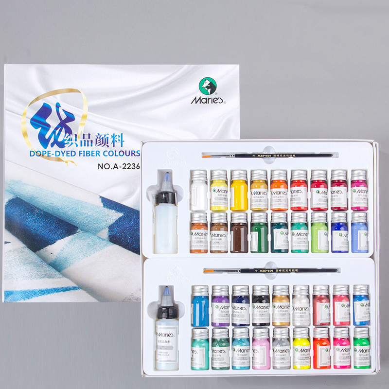 Fabric paint set with 36 colour vials and seasoning medium on white background