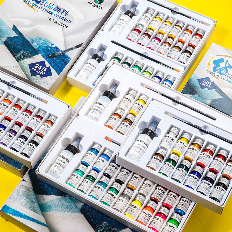 Open fabric paint set showing rows of 10 ml pigment bottles in assorted colours