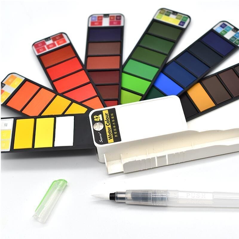 Travel watercolour paint set fanned open displaying full colour palette